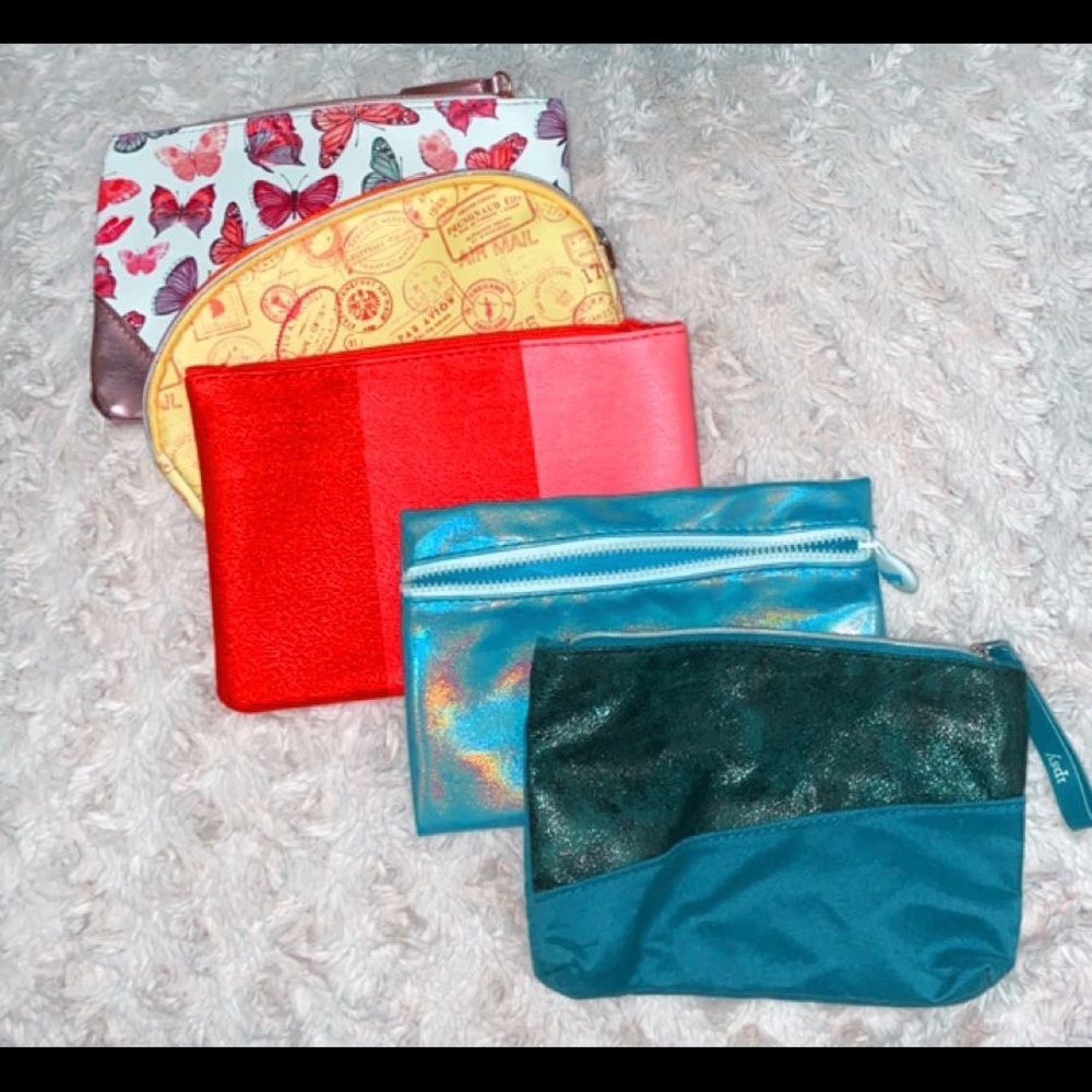 collection of Ipsy bags